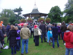 Audience enjoying music in the rain